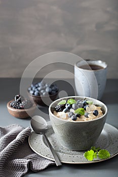 healthy breakfast steel cut oatmeal porridge with blueberry blackberry