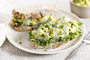 Healthy breakfast toast with avocado egg salad