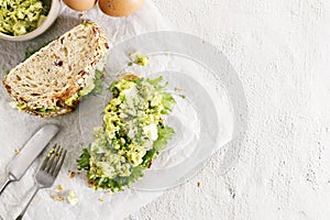 Healthy breakfast toast with avocado egg salad