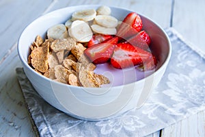 Healthy Breakfast which included cornflakes and oatflakes, yogurt, bananas photo