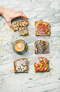 Healthy breakfast with wholegrain toasts , coffee over marble background