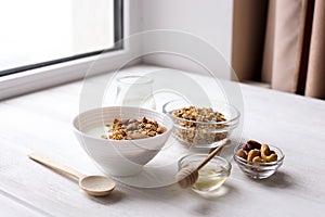 Healthy breakfast on window sill homemade granola with nuts