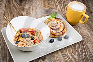 Healthy breakfast on wooden background