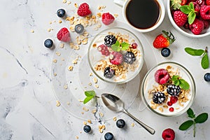 Healthy Breakfast with Yogurt and Berries on Marble Surface