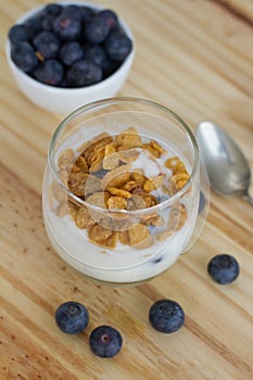 Healthy Breakfast: yogurt with blueberries and corn cereals