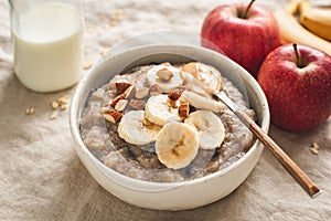 Healthy Breakfat Oatmeal Porridge Bowl With Banana, Almonds