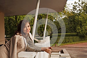 Healthy brunette woman with brown hair outdoor