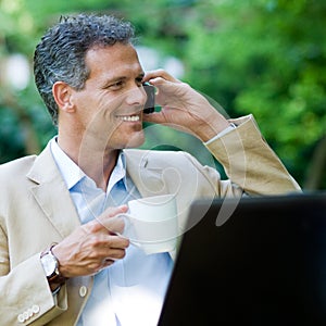 Healthy businessman working outdoor