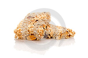 Healthy cereal granola bar with nuts and dry fruit on w