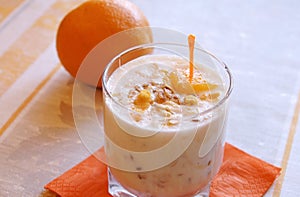 Healthy cereal and orange yoghurt breakfast