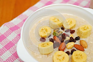 Healthy cereal topped with fruit and nuts