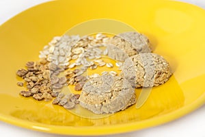 Healthy cereals and cookies on plate. Selective focus.