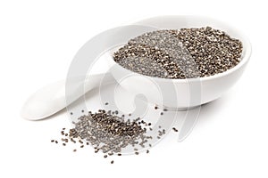 Healthy chia seeds isolated over a white background