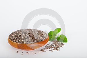 Healthy chia seeds lat. Salvia hispanica in wooden bowl