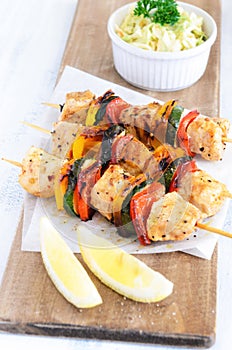 Healthy chicken kebabs and coleslaw