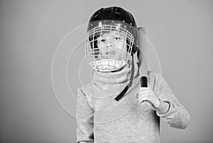 Healthy childhood. Baseball training concept. Boy in helmet hold baseball bat. Sport and hobby. Care about safety