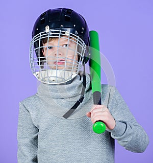 Healthy childhood. Join baseball team. Baseball training concept. Boy in helmet hold baseball bat. Sport and hobby. Care