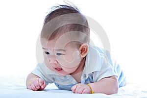 Healthy children. Cute crawling baby. Adorable baby girl, on white background.