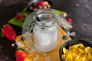 Healthy coconut milk with coconut flakes in soft sunlight