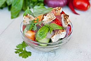 Healthy cooking of salad with fresh delicious ingredients making on cutting board.