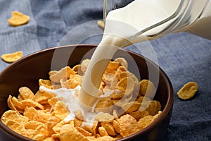 Healthy corn flakes with milk for breakfast