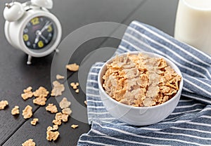 Healthy Corn Flakes with milk for Breakfast on table