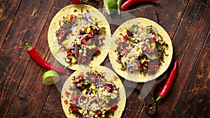 Healthy corn tortillas with grilled beef, fresh hot peppers, cheese, tomatoes