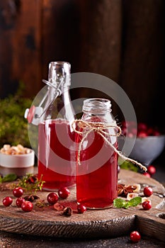 Healthy cranberry juice drink and fresh cranberries. Cranberry tea.
