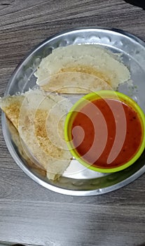 Healthy and crunchy wheat flour dosa with tomato chatni