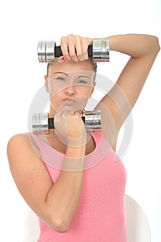 Healthy Determined Fit Young Woman Holding Dumb Bell Weights Pulling Expression