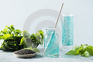 Healthy detox beverage with basil seeds, lime.