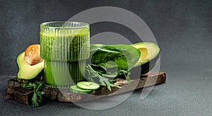 healthy detox, vegetarian concepts drinks. Green smoothie on a blue background, Long banner format