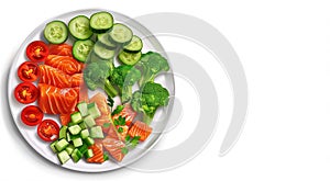 Healthy diet breakfast of pieces of red salmon, green cucumbers, avocado, broccoli and red tomatoes, on a plate