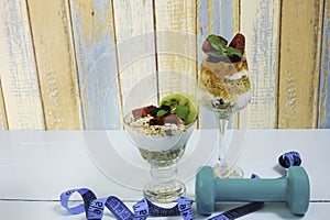 Healthy Diet concept with Delicious fruit, greek yogurt and granola parfaits