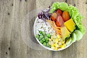 Healthy and diet food , fresh vegetable salad on wood table background have copy space