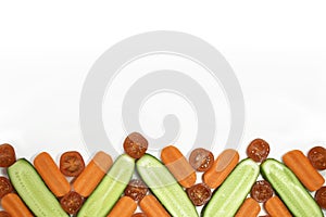 Healthy diet fresh vegetables flat lay border isolated on white. Tomato, carrot, cucumber in decorative composition