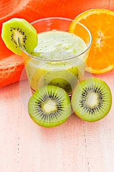 Healthy diet fruit juice kiwi orange wooden table