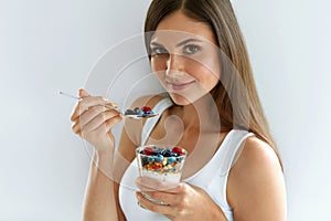 Healthy Diet Nutrition. Woman Eating Yogurt, Berries And Cereal