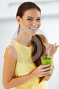 Healthy Diet. Woman Drinking Green Detox Juice. Lifestyle. Nutrition Drinks