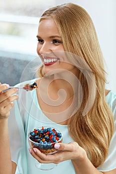 Healthy Diet. Woman Eating Cereal, Berries In Morning. Nutrition