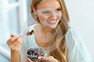 Healthy Diet. Woman Eating Cereal, Berries In Morning. Nutrition