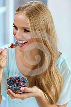 Healthy Diet. Woman Eating Cereal, Berries In Morning. Nutrition