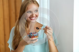 Healthy Diet. Woman Eating Cereal, Berries In Morning. Nutrition