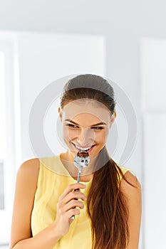 Healthy Diet. Woman With Spoon In Mouth. Eating, Food, Lifestyle