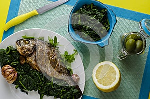 Healthy dinner or lunch with baked dorada fish