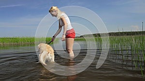 Healthy dog and happy owner play together.