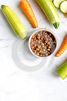 Healthy dogfood set with vegetables on white table top view mock-up