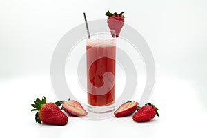 Healthy drink - Strawberry juice in glass - white background