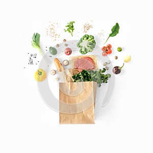 Healthy eating background top view Full paper bag healthy food