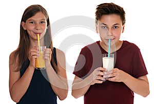 Healthy eating children drinking milk and orange juice